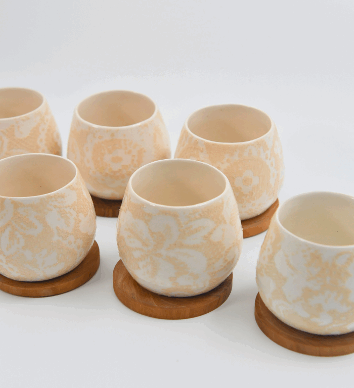 Set of 6 ceramic cups with wooden saucers